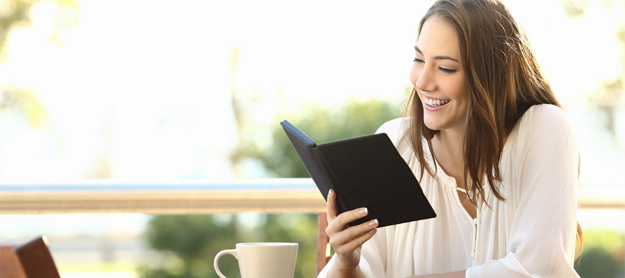 woman reading blog